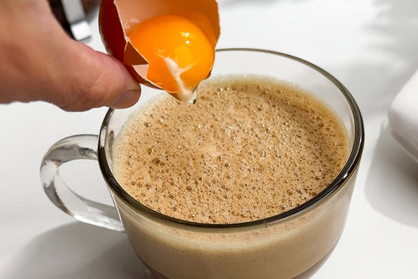 Add an egg yolk to coffee for a frothy treat.