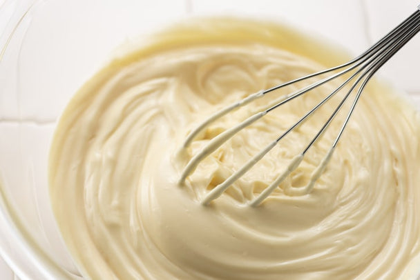 whisking a bowl of mayo