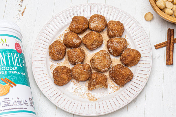 Cinnamon Sugar Keto Donut Holes on a white plate next to Primal Kitchen Snickerdoodle Collagen Fuel