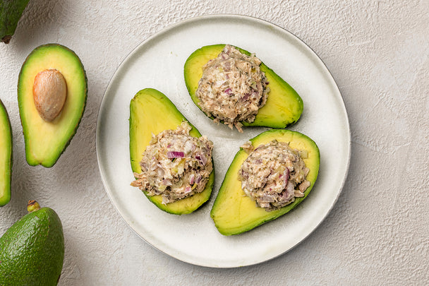 Tuna Salad Avocado Boats on a white plate