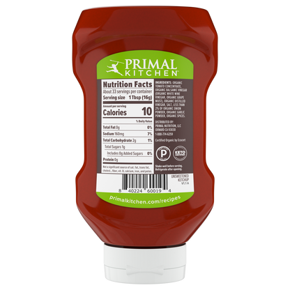 Backside of Primal Kitchen Unsweetened Squeeze Ketchup bottle showing nutrition facts and ingredients list